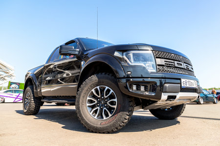 Samara, Russia - June 26, 2022: Off-road 4x4 Ford F-150 vehicle with all terrain tires Nokian Tires. Black all terrain vehicle Ford 4x4のeditorial素材