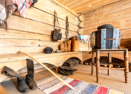 Veliky Novgorod, Russia - August 26, 2022: Interior of old traditional rural wooden house in russian village. Museum of wooden architecture Vitoslavlitsyのeditorial素材