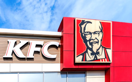 Samara, Russia - August 28, 2022: KFC fast food restaurant logo. Kentucky Fried Chicken (KFC) is the...