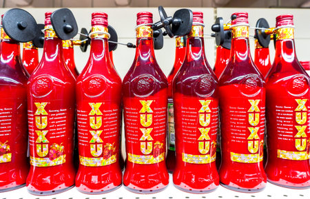Samara, Russia - April 23, 2023: XUXU strawberry liqueur with vodka on the shelf in a superstore....