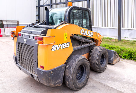 Samara, Russia - May 20, 2023: Skid steer loader CASE SV185 at the city street