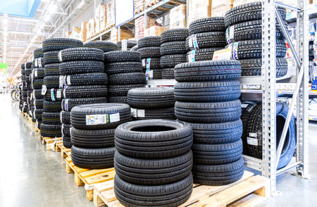 Samara, Russia - September 26, 2023: Assortment of tires for car at the chain superstore, replacement of winter and summer tires. seasonal tire replacement conceptのeditorial素材