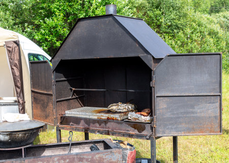 Metal stove for cooking food on coals. Stove for preparing food grilling. BBQ stoveの写真素材