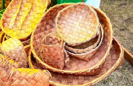 Various tableware handcrafted from woven birch barkの写真素材