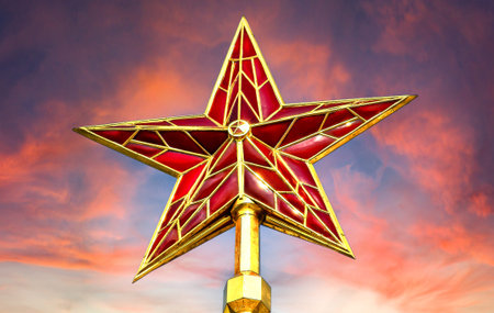 Red ruby star of Moscow Kremlin tower against the red crimson sky