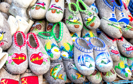 Traditional Russian felt boots of different design and patterns. Embroidered felt boots for winter...