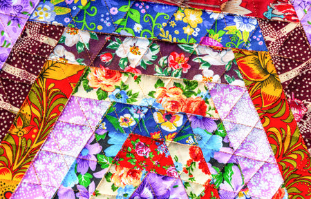 Multicolored creative background from handmade multicolor doormat. Texture of rug from different...