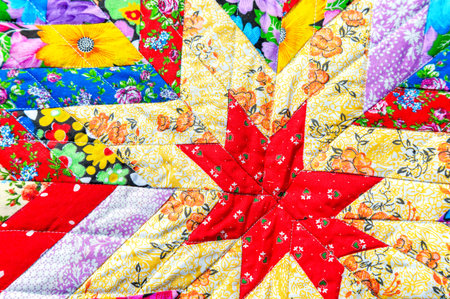 Multicolored creative background from handmade multicolor doormat. Texture of rug from different...