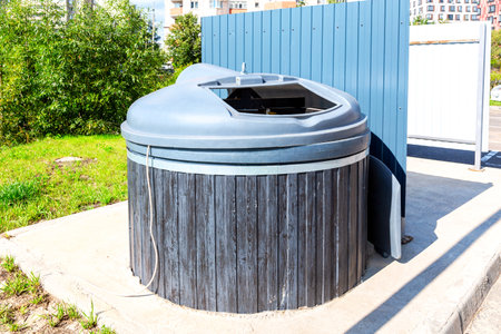 Big modern round garbage container for household wasteの写真素材