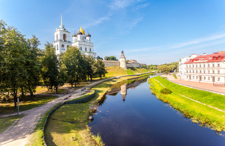 View of the Pskov Kremlin and the embankment of the Pskova river in Pskov, Russiaの写真素材