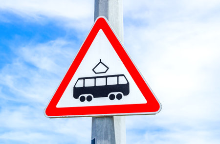 Sign showing that there is a tram line across the road.の写真素材