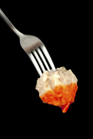 Steamed Pork Dumpling Dipped in Chili Sweet Sauceの写真素材