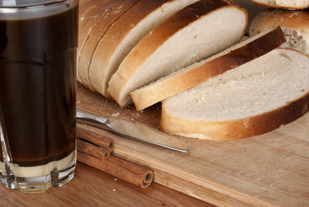 Sliced White Bread Loaf & Coffee in a Thumbler