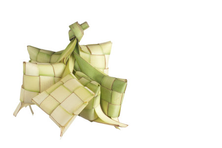 Ketupats, a natural food casing made from young coconut leaves for cooking riceの写真素材