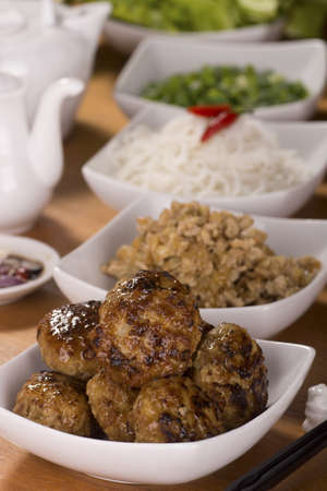 Cambodian Banchao; Grilled Pork Patties typically served with vegetables, rice vemicelli, condiments, fish sauce and sometimes, a broth. Unsharpened Fileの写真素材