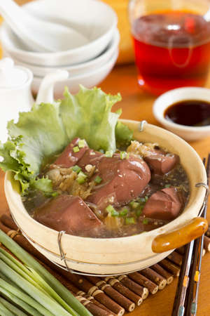 Blood Pudding Cubes in Clear Chicken Broth Non sharpenの写真素材