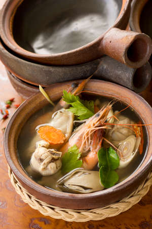 Tom Yam Ruam Pak or Clear Tom Yam Soup with Chicken and Prawns. Non sharpenの写真素材