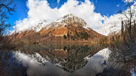 Mountain lake autumn winter scenery landscapeの写真素材