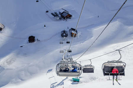 Sochi, Russia - January 20, 2013: Snowy Aibga cirque ski slopes and chair lifts in Krasnaya Polyana winter mountain resort can be hosting skiers and snowboard riders right until Juneのeditorial素材