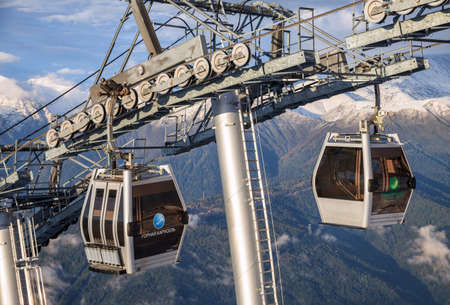 Sochi, Russia - September 28, 2013: Cableway gondola lifts in Krasnaya Polyana ski mountain resort can transport tourists up to the alpine slopes all the year roundのeditorial素材