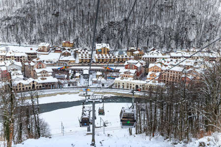 Sochi, Russia - January 9, 2015: Ski slopes, cableway lifts, hotels and apartments of Gorky Gorod winter mountain resort can be hosting skiers and snowboard riders during 6 month a yearのeditorial素材