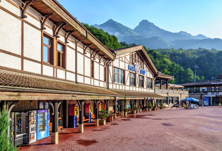 Sochi, Russia - July 30, 2014: Beautiful sunset townscape of Rosa Khutor mountain ski resort...