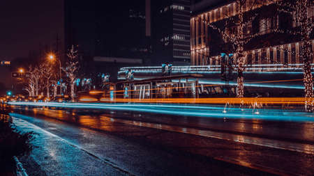 Traffic flow on downtown road at nightのeditorial素材