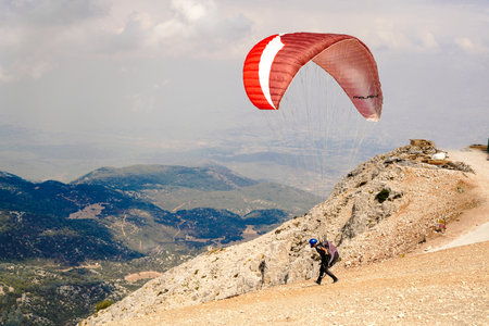 Fethiye, Mugla/Turkey- August 19 2018: Paragliders preparing the equipment on Babadag for the launching / Ready to flyのeditorial素材