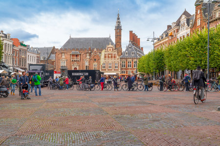 Haarlem/Holland - October 06 2019:  People walking and cycling in city center. Haarlem is the capital of the province of North Holland and popular tourist place.のeditorial素材