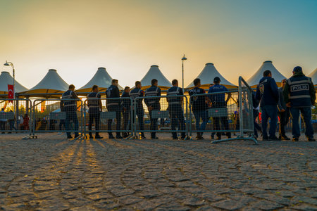 Sogut, Bilecik / Turkey - September 08 2019: Rear view of policemen and policewomen standing in a checkpointのeditorial素材