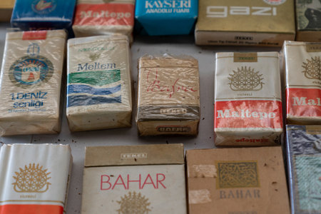 Ankara, Turkey-February 2 2020:  Turkish retro cigarettes package brand collection in a flea market for sale, selective focus.のeditorial素材