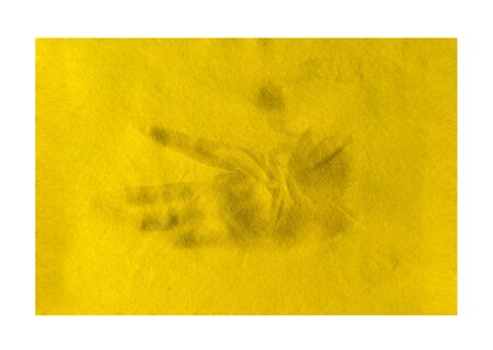 Handprint remaining on yellow cleaning cloth after dustingの写真素材