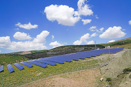 Solar park with blue cells on a green field, Sivas, Turkey