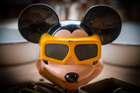 Ankara, Turkey-February 2 2020: Mickey Mouse toy wearing 3d goggles in a flea market for sale.