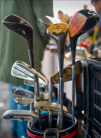 Ankara, Turkey-February 2 2020: Old golf clubs sold in antique market, selective focus.のeditorial素材