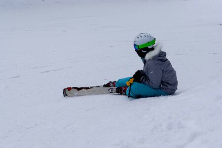Back view of siker girl sitting and relaxingの写真素材