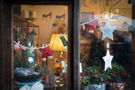 Atmospheric Christmas window sill decoration: snow, tree, candle, rocking