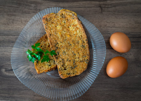 Sliced bread covered eggs (Yumurtali ekmek) for breakfast