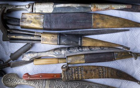 Antique roman, medieval, ottoman  stile knifes, daggers and swords in a  collection.