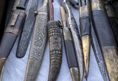 Antique roman, medieval, ottoman  stile knifes, daggers and swords in a  collection.の写真素材
