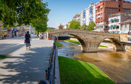 Kastamonu / Turkey - August 04 2019: Multi arched stone bridge in city center. (Nasrullah Koprusu or Kambur Kopru in Turkish)のeditorial素材