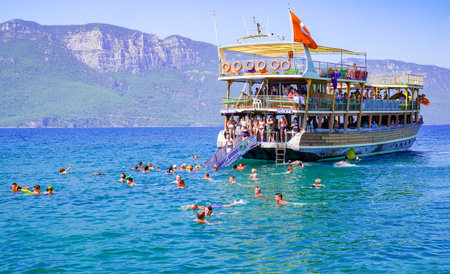 Mugla, Turkey-August 15 2018: Tourists enjoy daily boat tourのeditorial素材