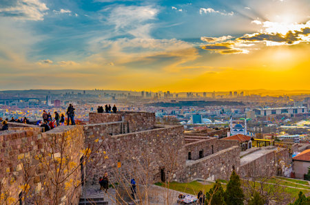 Ankara/Turkey-February 02 2019: Cityscape view from Ankara Castle in the sunset and people enjoying...