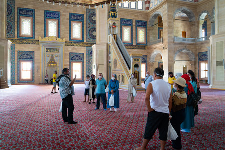 Adana/Turkey- September 13 2020: Interior view of Sabanci Central Mosque with visitorsのeditorial素材
