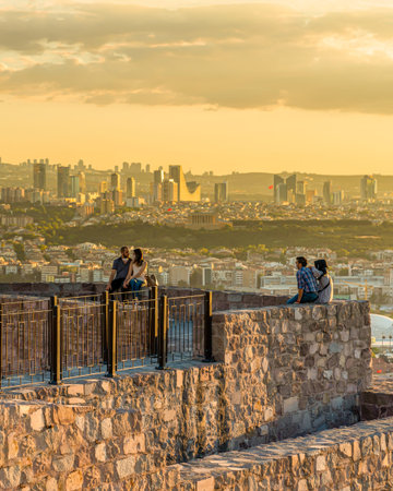 Ankara, Turkey-September 9 2020: Ankara Castle at sunset and couples enjoying on the top of the castle during pandemicのeditorial素材