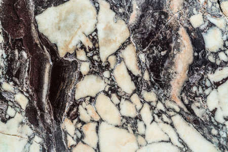 Old, broken, cracked marble. Repaired marble.の写真素材