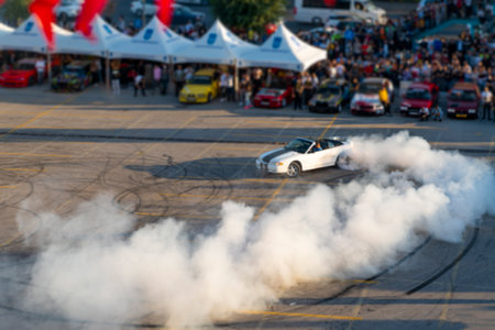 Blurred unfocused top view of car drift show.のeditorial素材