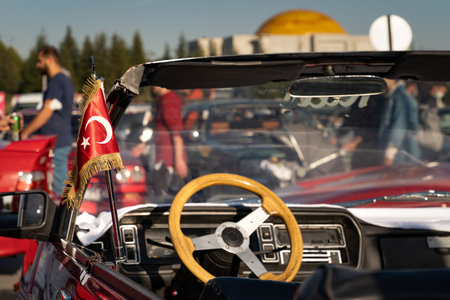 Ankara, Turkey - November 21 2021: A shabby, open-top modified vehicle with a wooden steering wheel and a Turkish flag is parked on the street.のeditorial素材