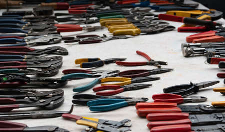 Retro colorful second hand metal wrenches sold on flea market.の写真素材