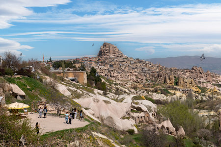 Nevsehir, Turkey - April 24 2022: Tourists enjoy Pigeon Valley with near Uchisar Castle.のeditorial素材